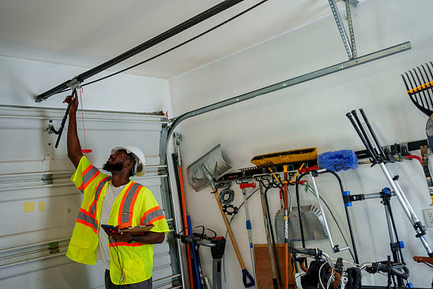 Professional Garage Door Panel Replacement technician working in Dickson City, PA